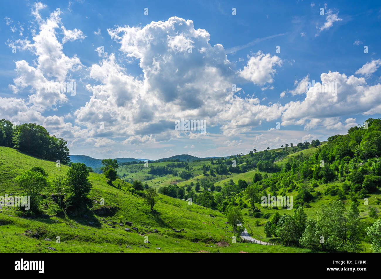 The karst and hilly landscape of the back country of West Virginia on a cloudy summer day. Stock Photo