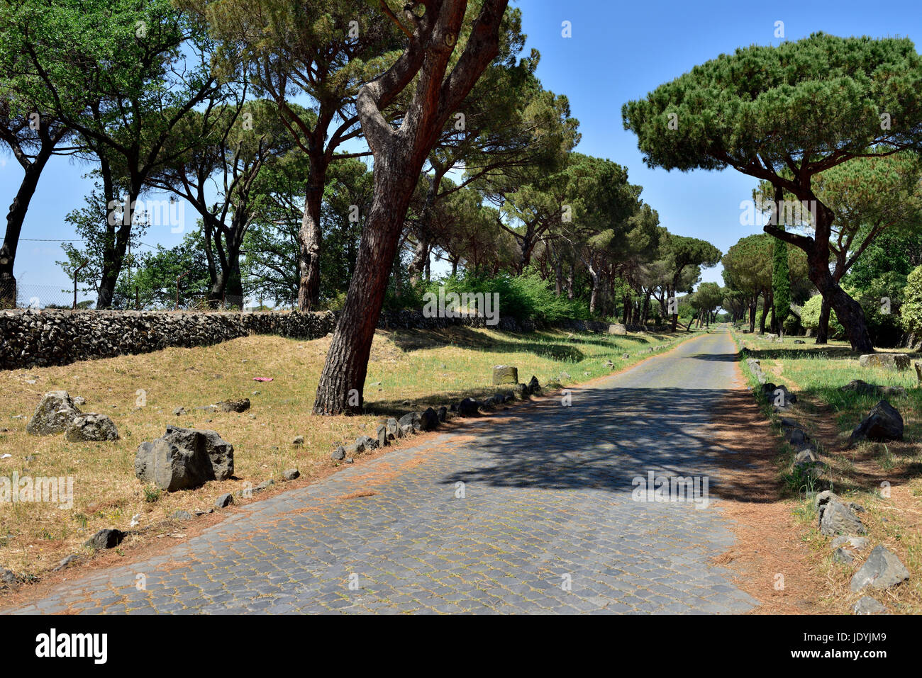 Old Appian Way (Via Appia Antica) built in 312 BC. Stone surfaced long straight roads from Rome Stock Photo
