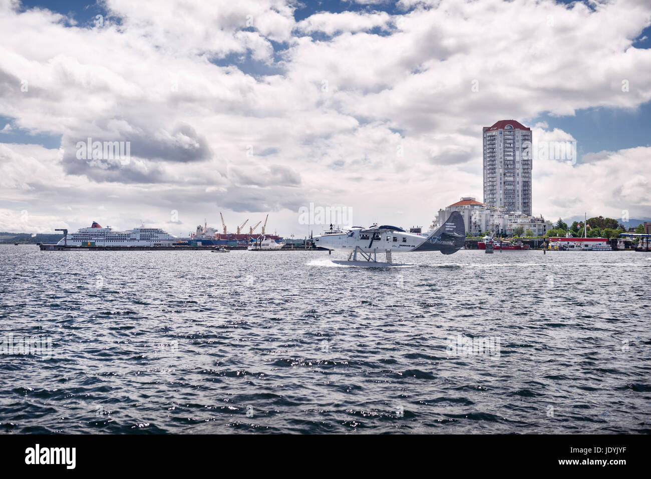 Fairmont Harbour Air seaplane taking off at Nanaimo harbour with