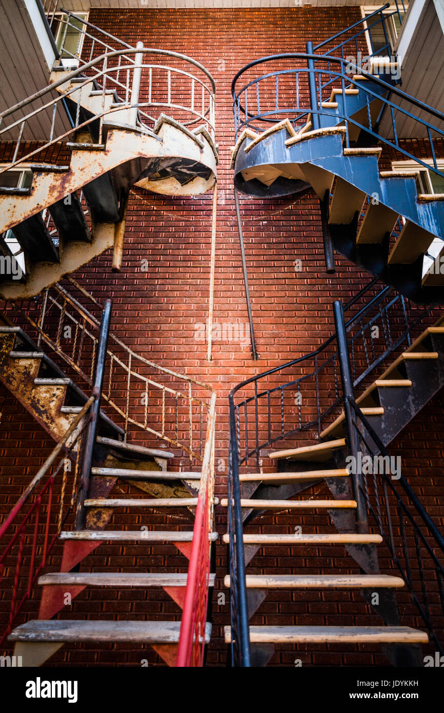 Editorial - July 24, 2014 in Trois-Riviere, Quebec, Canada. Symmetrical Staircases in the Poor Old Trois-Riviere Area where the poverty is always present, but where the houses are hystorical. Stock Photo