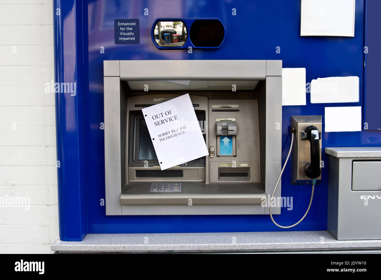 Out of Service sign taped to ATM machine. Horizontal. Stock Photo