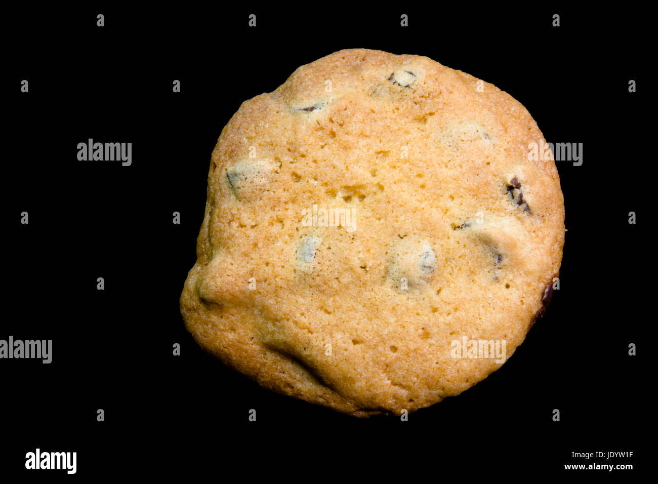 Chocolate chip cookie on black background. Stock Photo