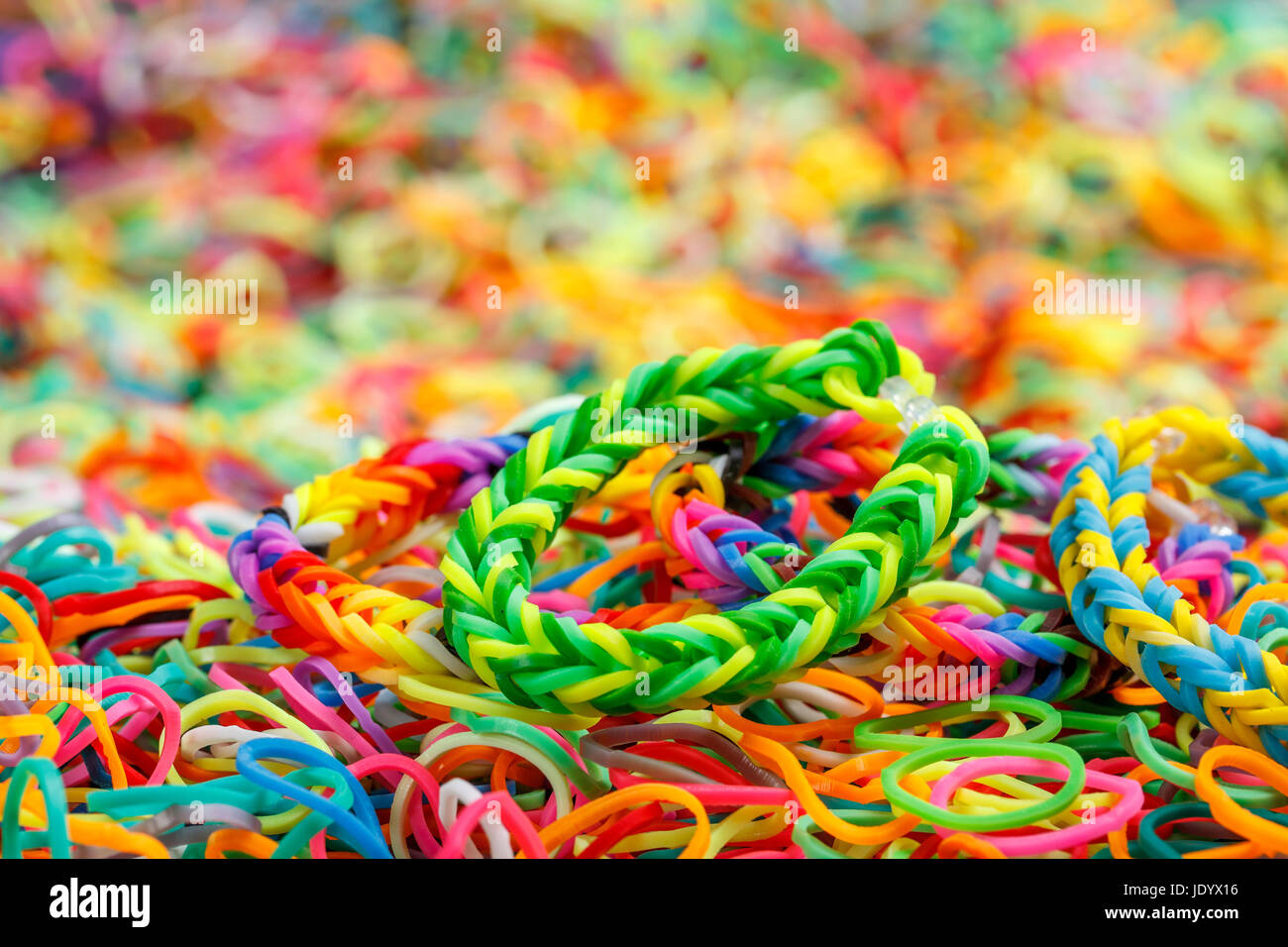 Colorful Rainbow loom bracelet rubber bands Stock Photo - Alamy