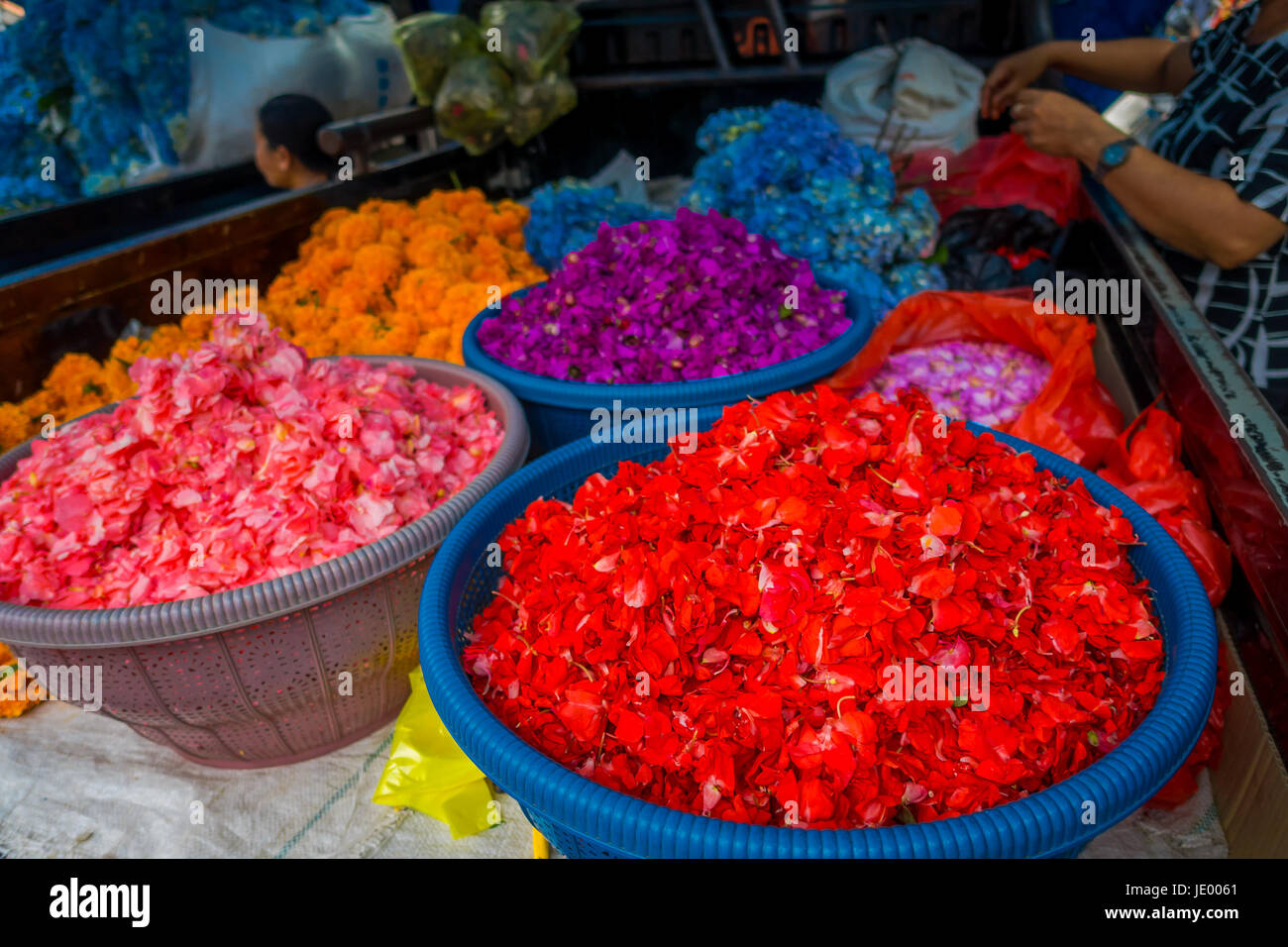 BALI, INDONESIA - MARCH 08, 2017: Outdoor Bali flower market. Flowers are used daily by Balinese Hindus as symbolic offerings at temples, inside of co Stock Photo