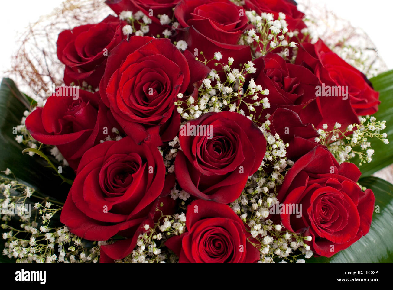 Red roses bouquet isolated on white background Stock Photo - Alamy