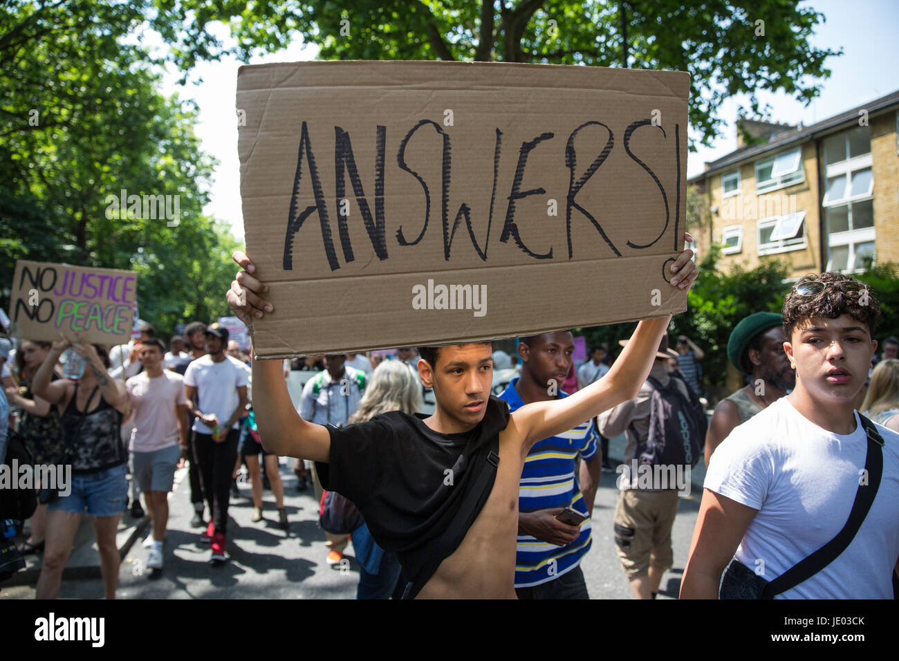 London, UK. 21st June, 2017. Activists from Movement For Justice By Any Means Necessary hold a 'Day of Rage' march from Shepherds Bush Green to Parliament Square to demand justice for those affected by the fire in the Grenfell Tower and to call for a change of government on the day of the Queen's Speech in Parliament. Credit: Mark Kerrison/Alamy Live News Stock Photo