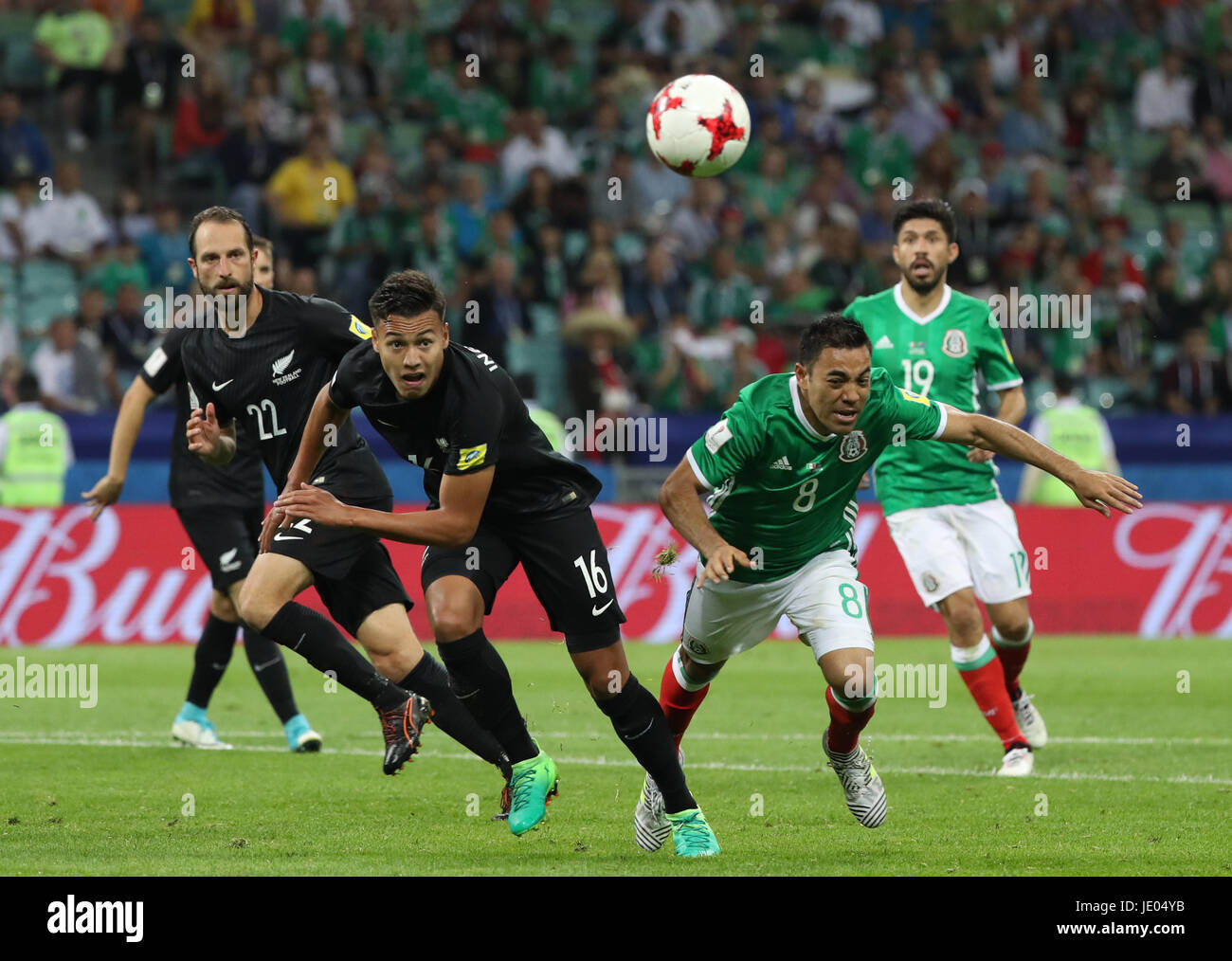 Sochi, Russia. 21st June, 2017. Marco Fabian (2nd R) of Mexico vies with Dane Ingham (2nd L) of New Zealand during the group A match between Mexico and New Zealand of the 2017 FIFA Confederations Cup in Sochi, Russia, on June 21, 2017. Mexico won 2-1. Credit: Xu Zijian/Xinhua/Alamy Live News Stock Photo