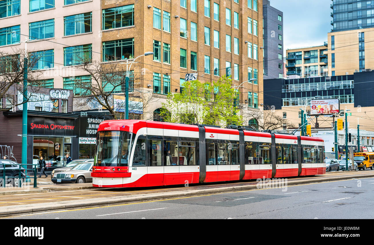 Modern streetcar on a street of Toronto. The Toronto streetcar system