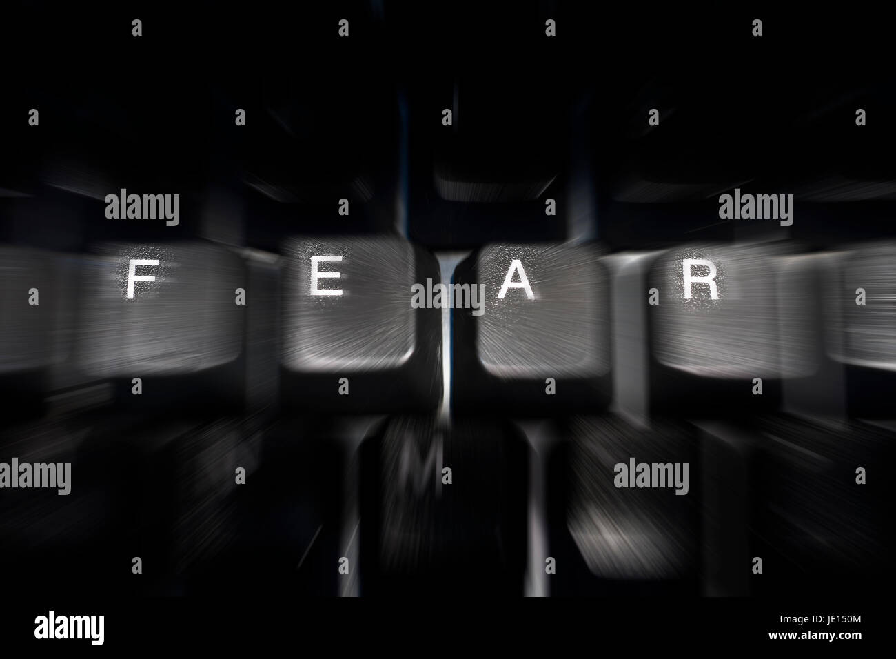 PC computer keyboard with the keys arranged to spell the word fear Stock Photo