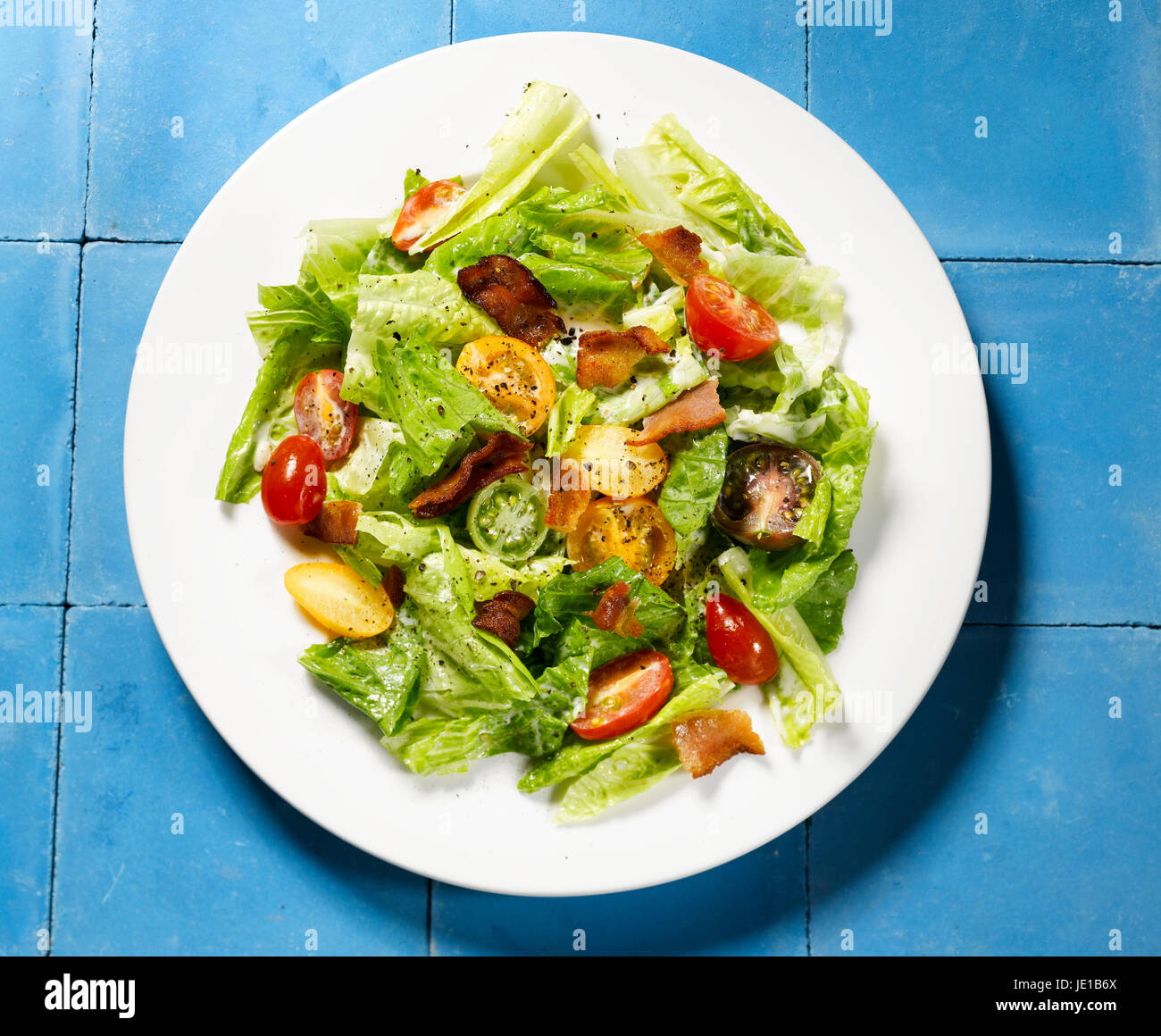 garden salad on white plate Stock Photo