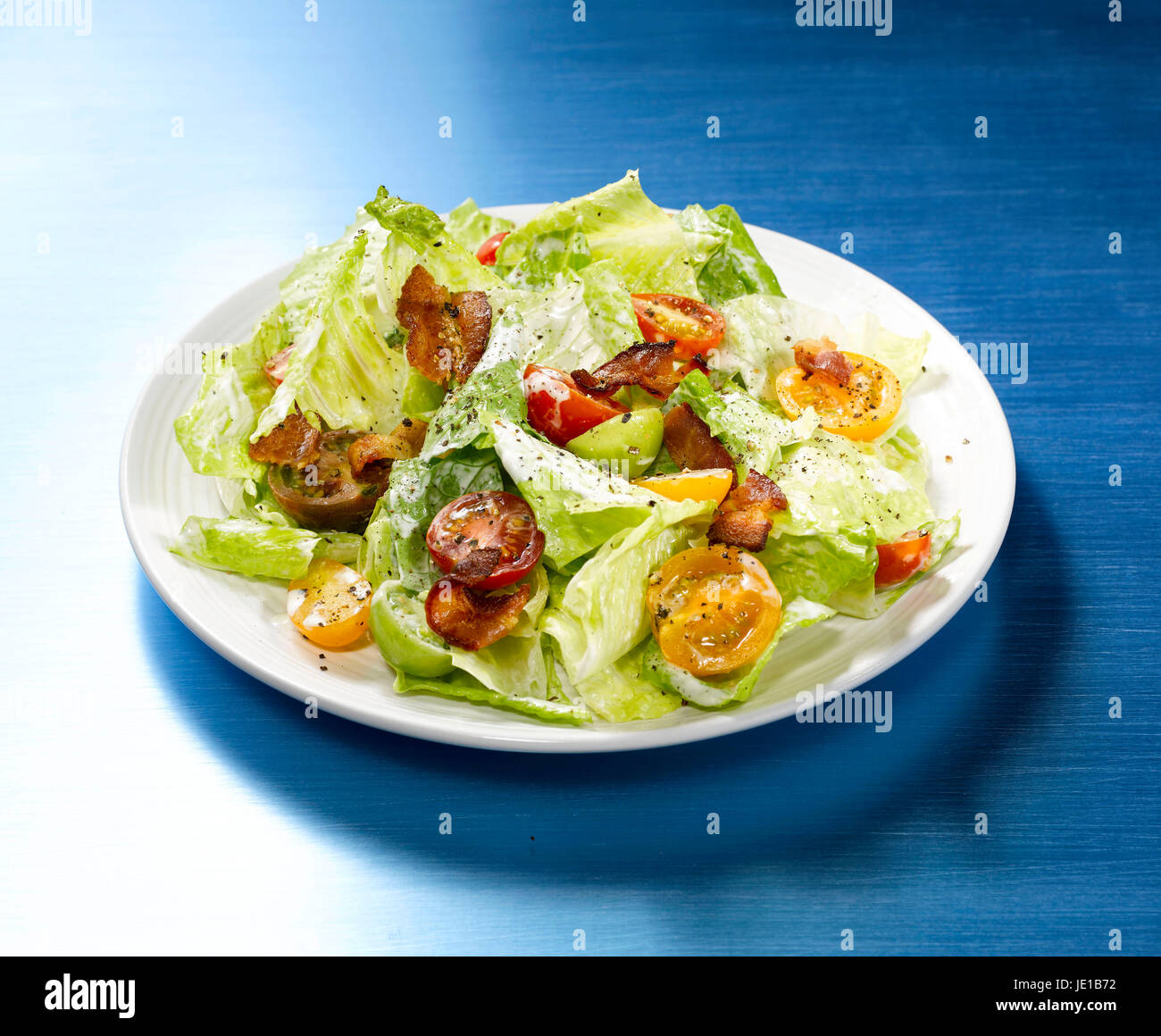 mixed green salad on plate Stock Photo