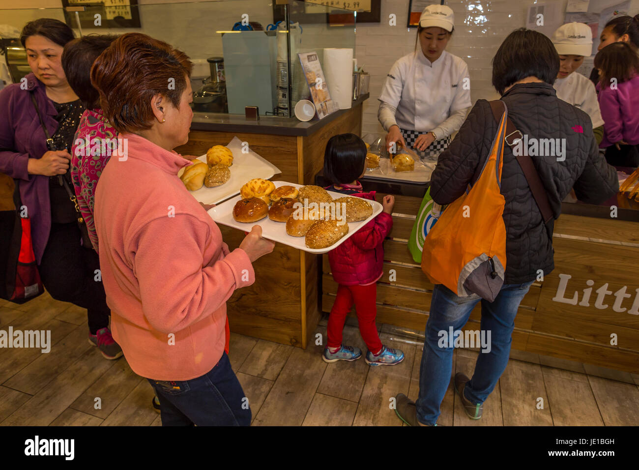 Chinese-Americans, Chinese-American people, shoppers, shopping, Little Swan Bakery, Stockton Street, Chinatown, San Francisco, California Stock Photo