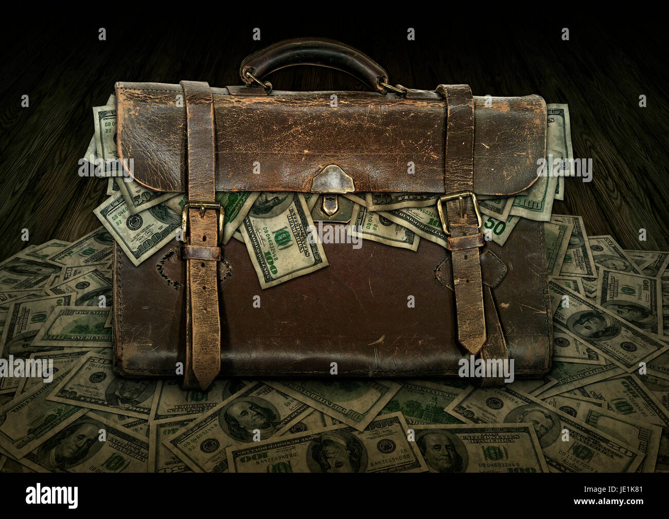 Antique briefcase filled and overflowing with money, fifty and one