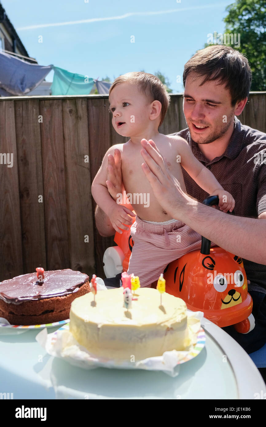 Father and son at first birthday party Stock Photo