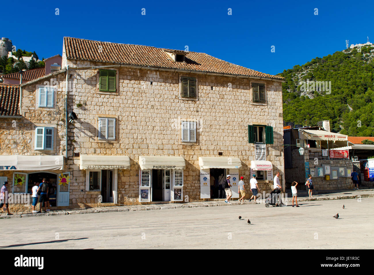STARI GRAD, CROATIA - JULY 7, 2009: Unidentified people at Stari Grad on Hvar island, Croatia. Hvar is one of the most popular and most visited destin Stock Photo