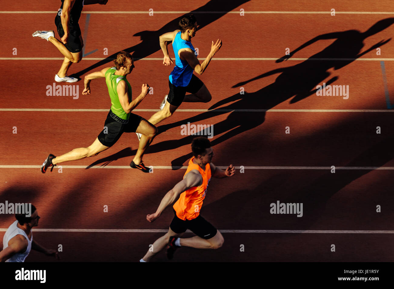 shadow runners men running sprint race at stadium during UrFO Championship in athletics Stock Photo