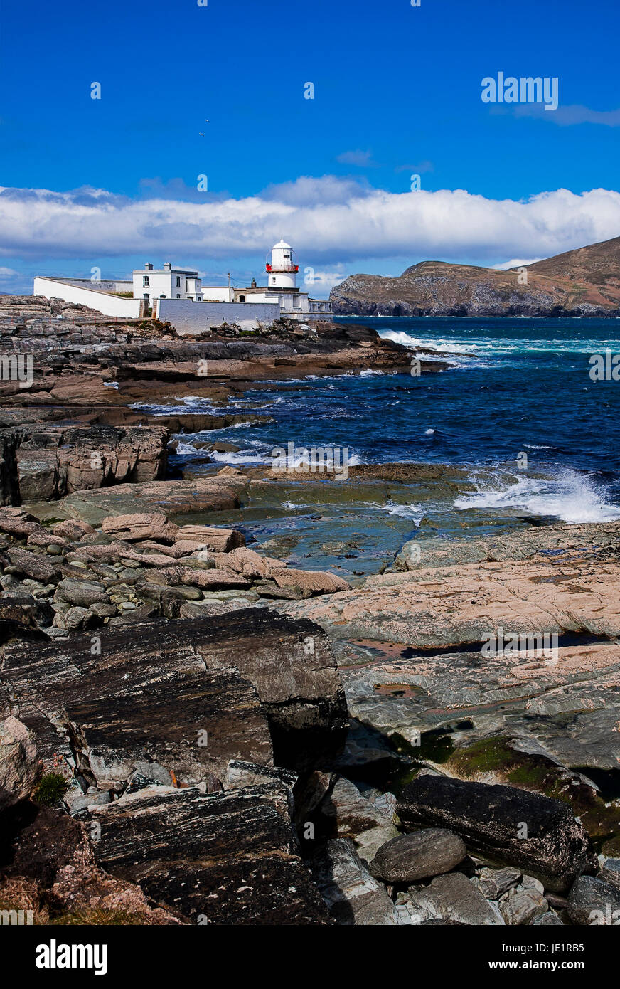 A Photo of Valentia Lighthouse from the Rocks, Taken on a Low tide, in Co Kerry, Ireland Stock Photo