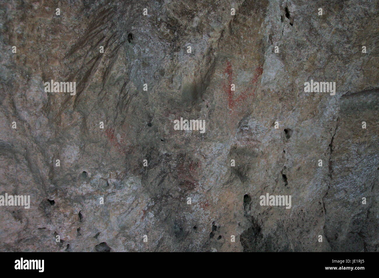 Tool chisel marks on rock walls medieval cave dwellings homes Ghar il