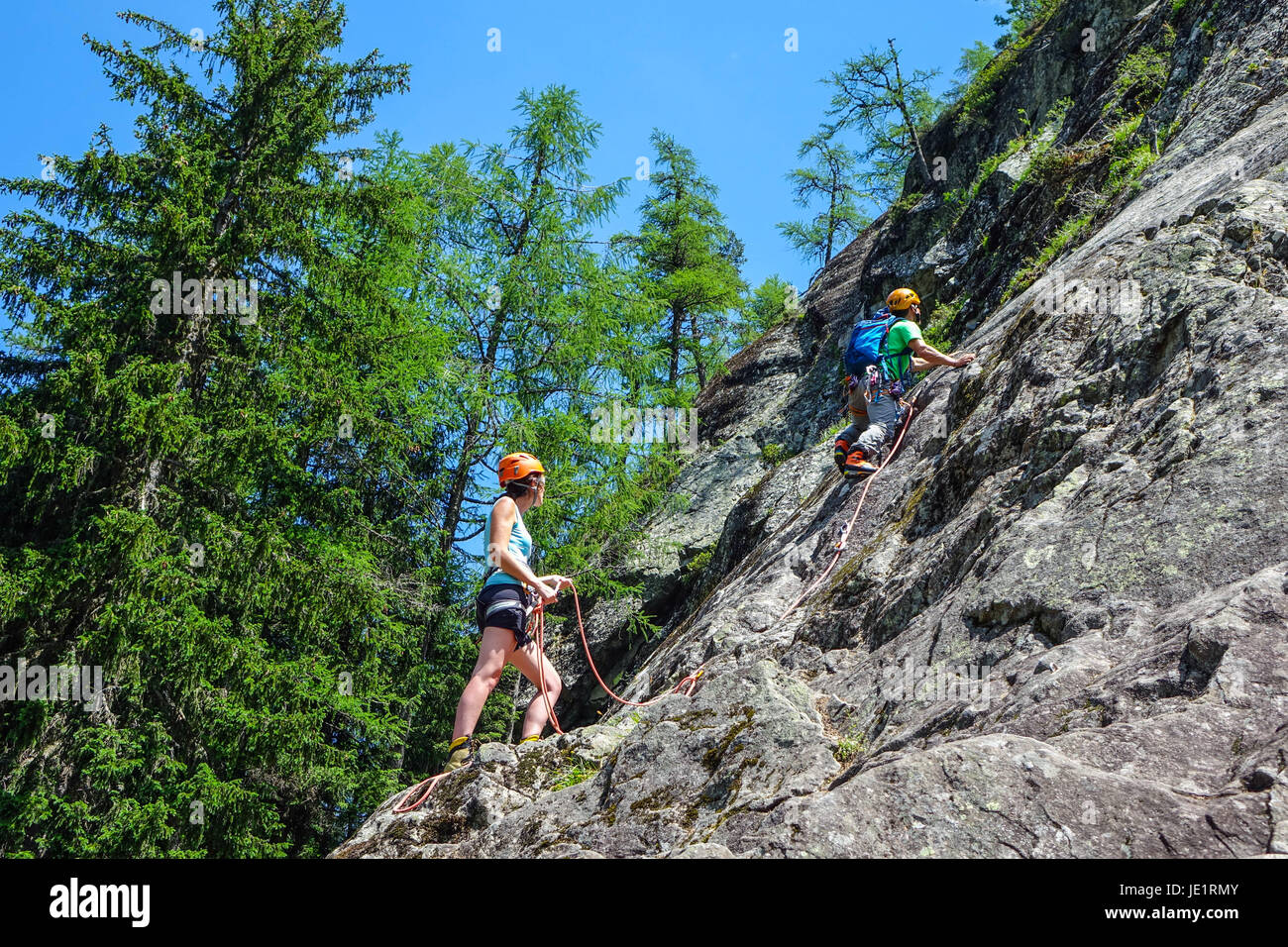 Two rock climbers on cliff face, Chamonix, France Stock Photo