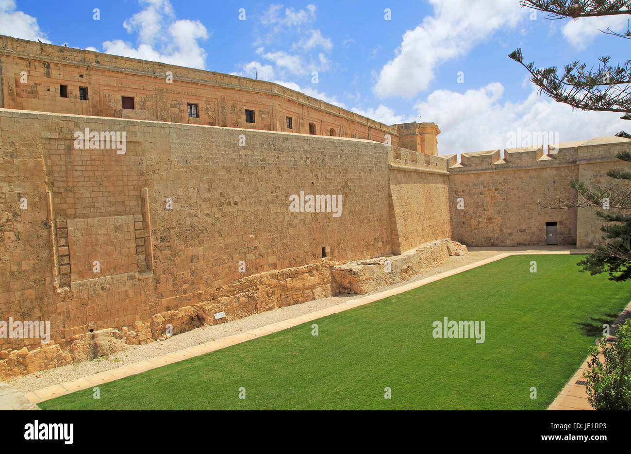 Defensive walls and moat ditch of medieval city of Mdina, Malta Stock