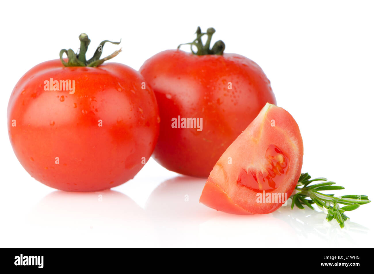 Red tomatoes isolated on white background Stock Photo - Alamy