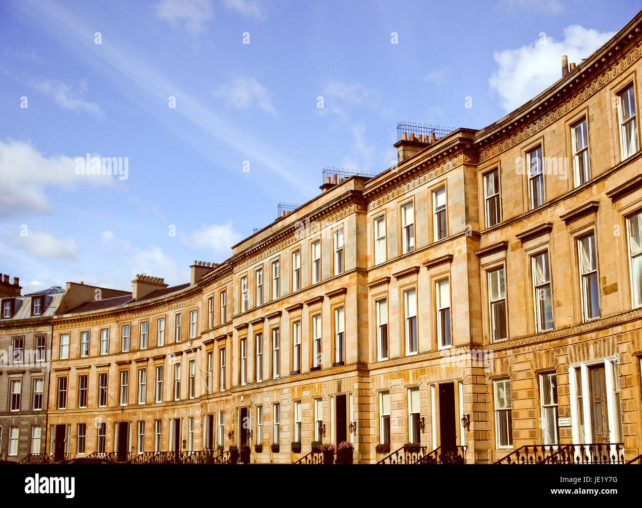 Vintage looking row of terraced houses in Glasgow West End, Scotland