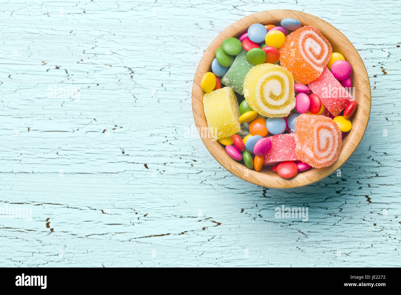 top view of colorful candy on old table Stock Photo - Alamy