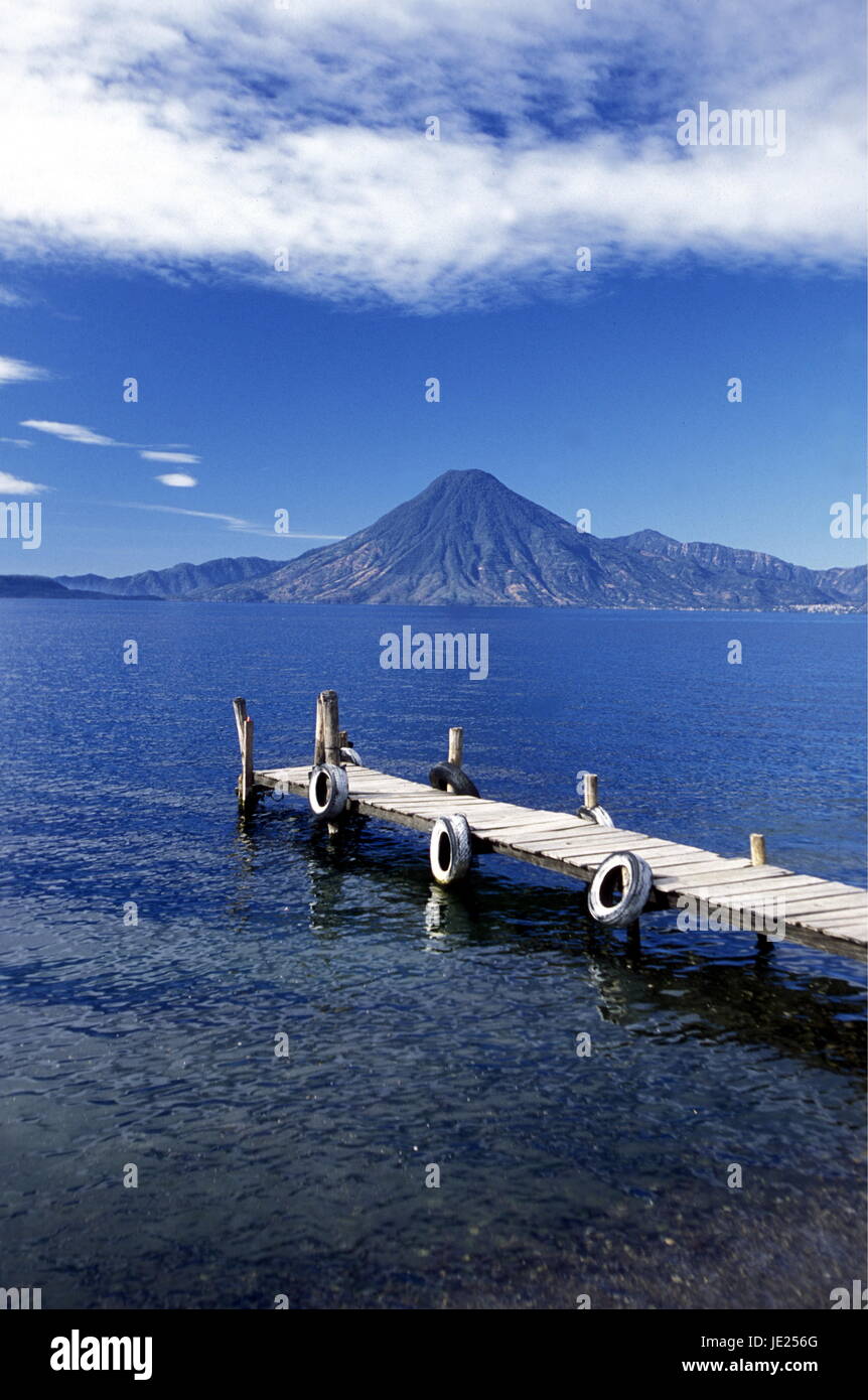 The Lake Atitlan mit the Volcanos of Toliman and San Pedro in the back at the Town of Panajachel in Guatemala in central America. Stock Photo
