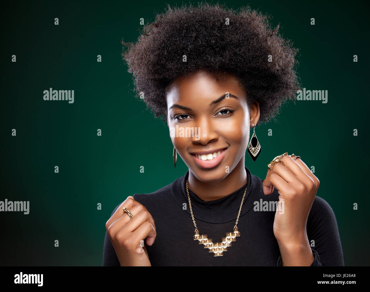 Beautiful young black woman with afro hairstyle Stock Photo - Alamy