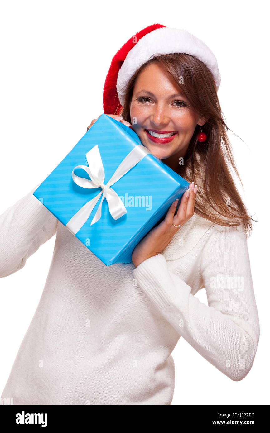 Junge frau mit braunen Haaren und Weihnachtsmütze mit einem großen