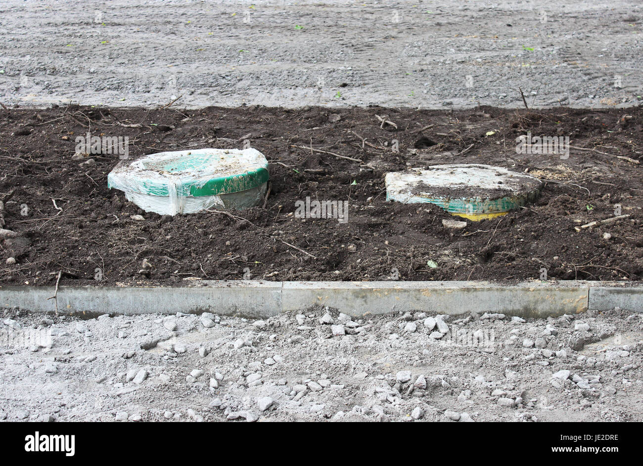 plastic tanks gas oil catcher bured in the ground during the construction of a car park for tourist buses, Russia Stock Photo