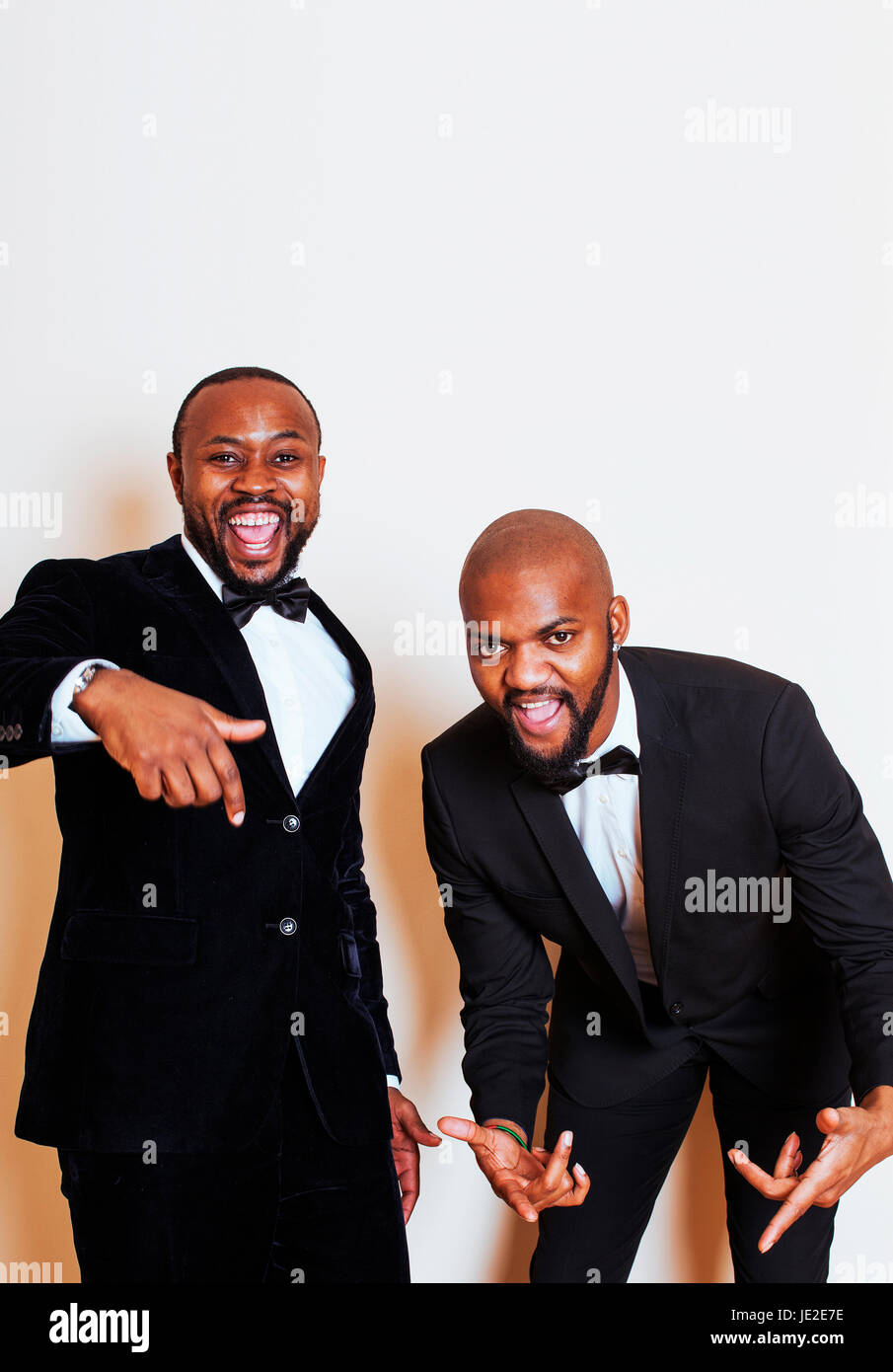 two afro-american businessmen in black suits emotional posing, g Stock ...