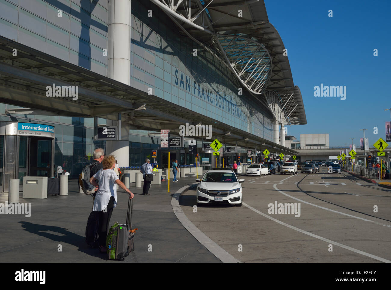 Travelers arriving at San Francisco International airport waiting for