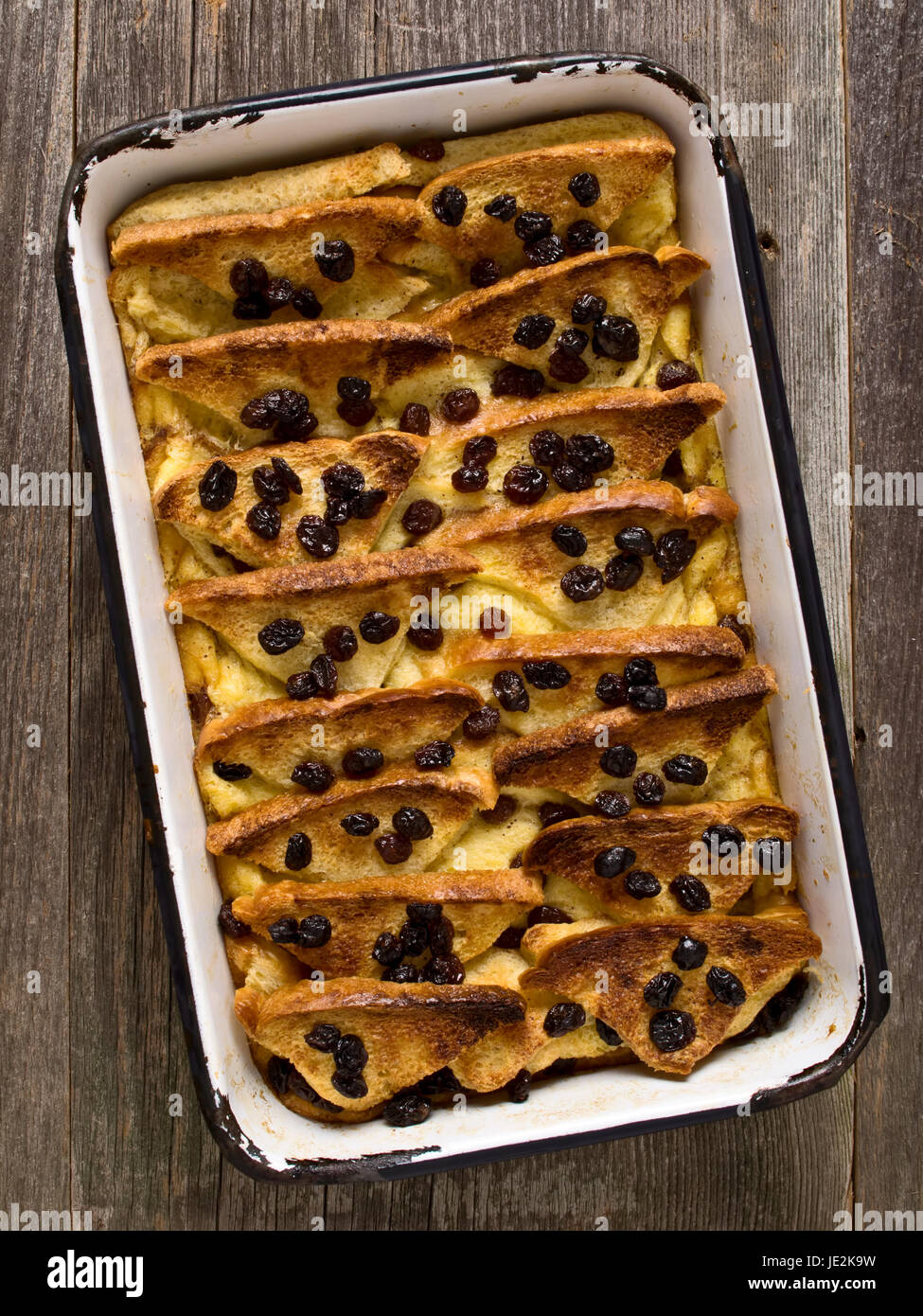 close up of rustic traditional british bread and butter pudding Stock Photo