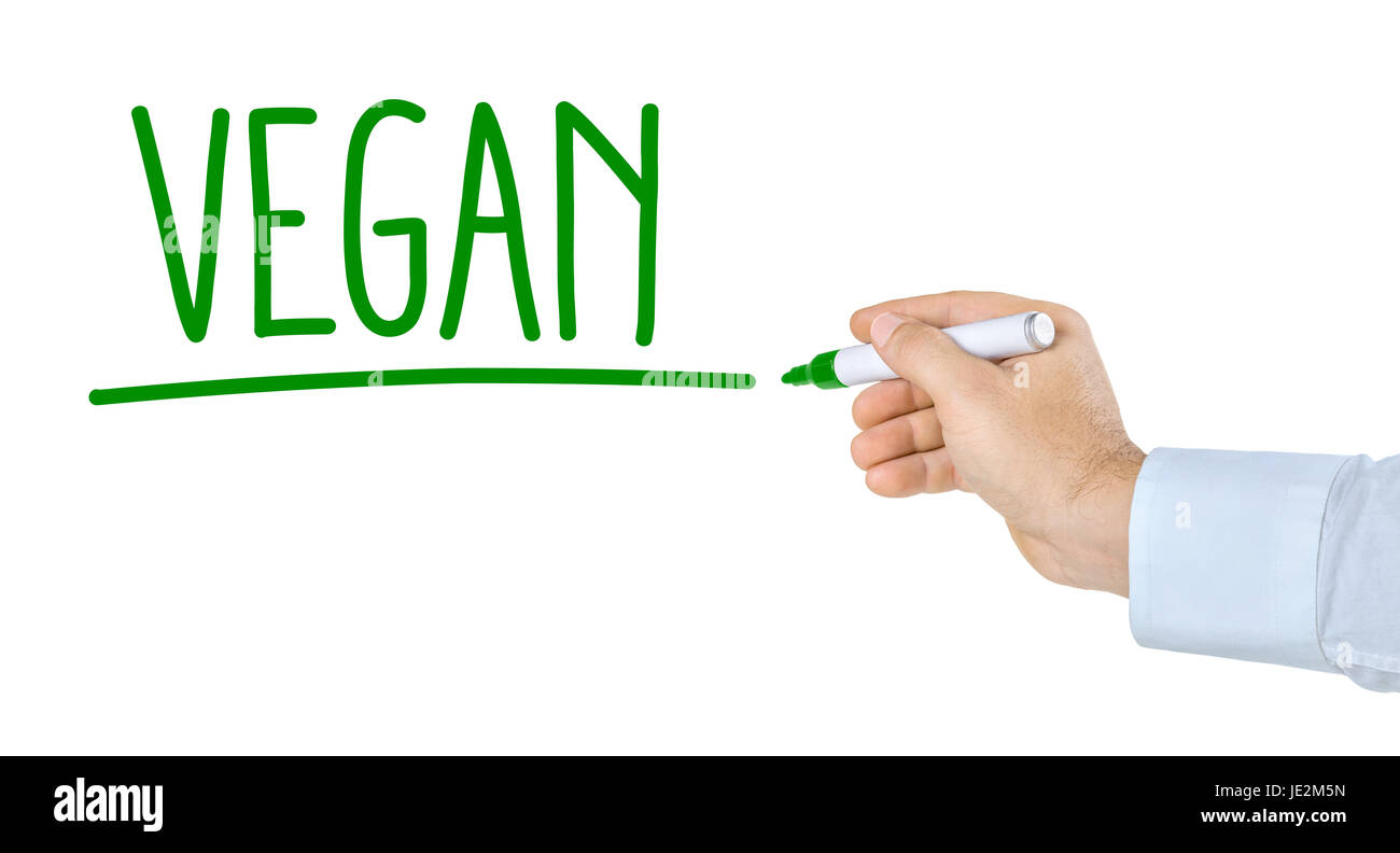 Hand mit Stift schreibt Vegan Stock Photo