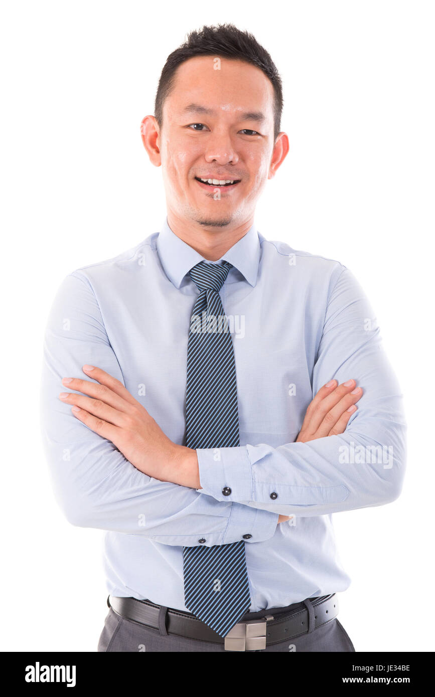 Asian business man smiling, standing isolated over white background ...