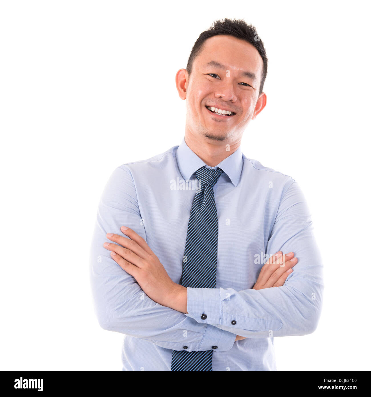 Handsome Asian business man smiling, standing isolated over white ...