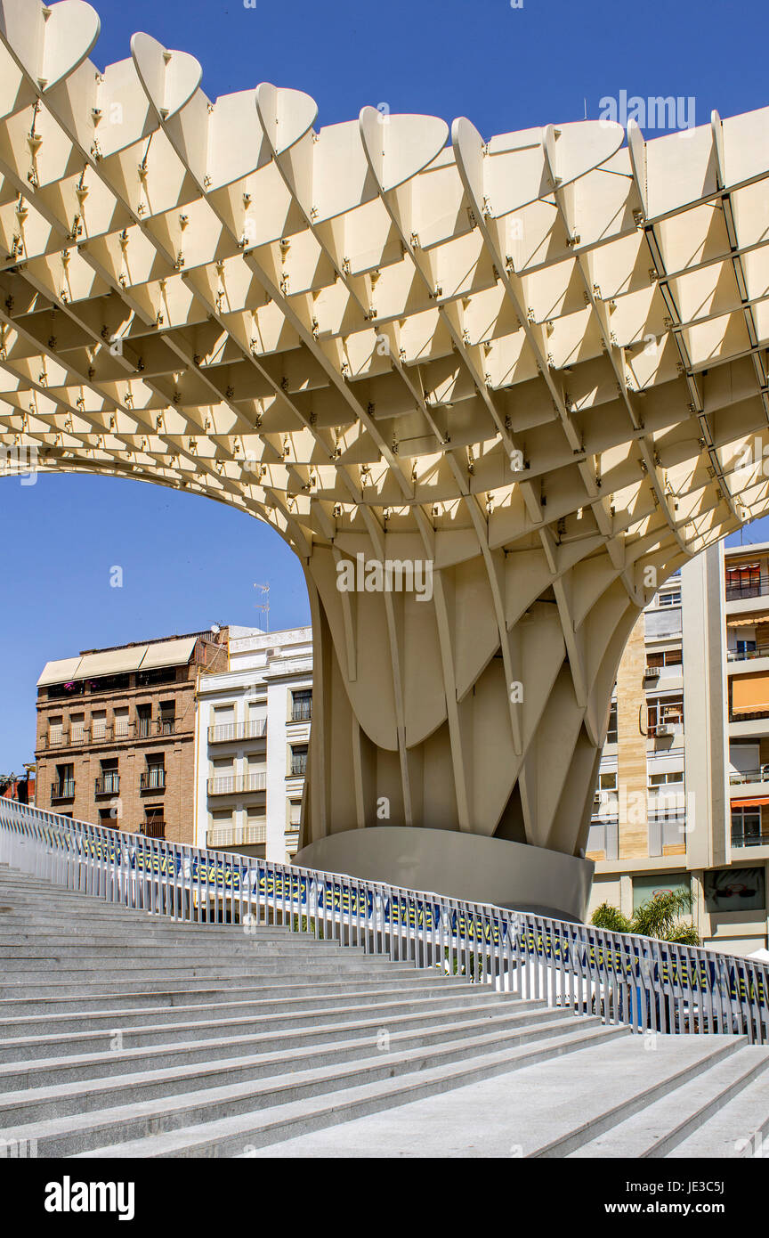 SEVILLE, SPAIN - MAY 2014: Metropol Parasol in Plaza de la Encarnacion on 31 of May 2014 in Sevilla,Spain. A new Seville Market Hall and attractive destination. Projected by J. Mayer H. architects, it is made from bonded timber with a polyurethane coating. Stock Photo