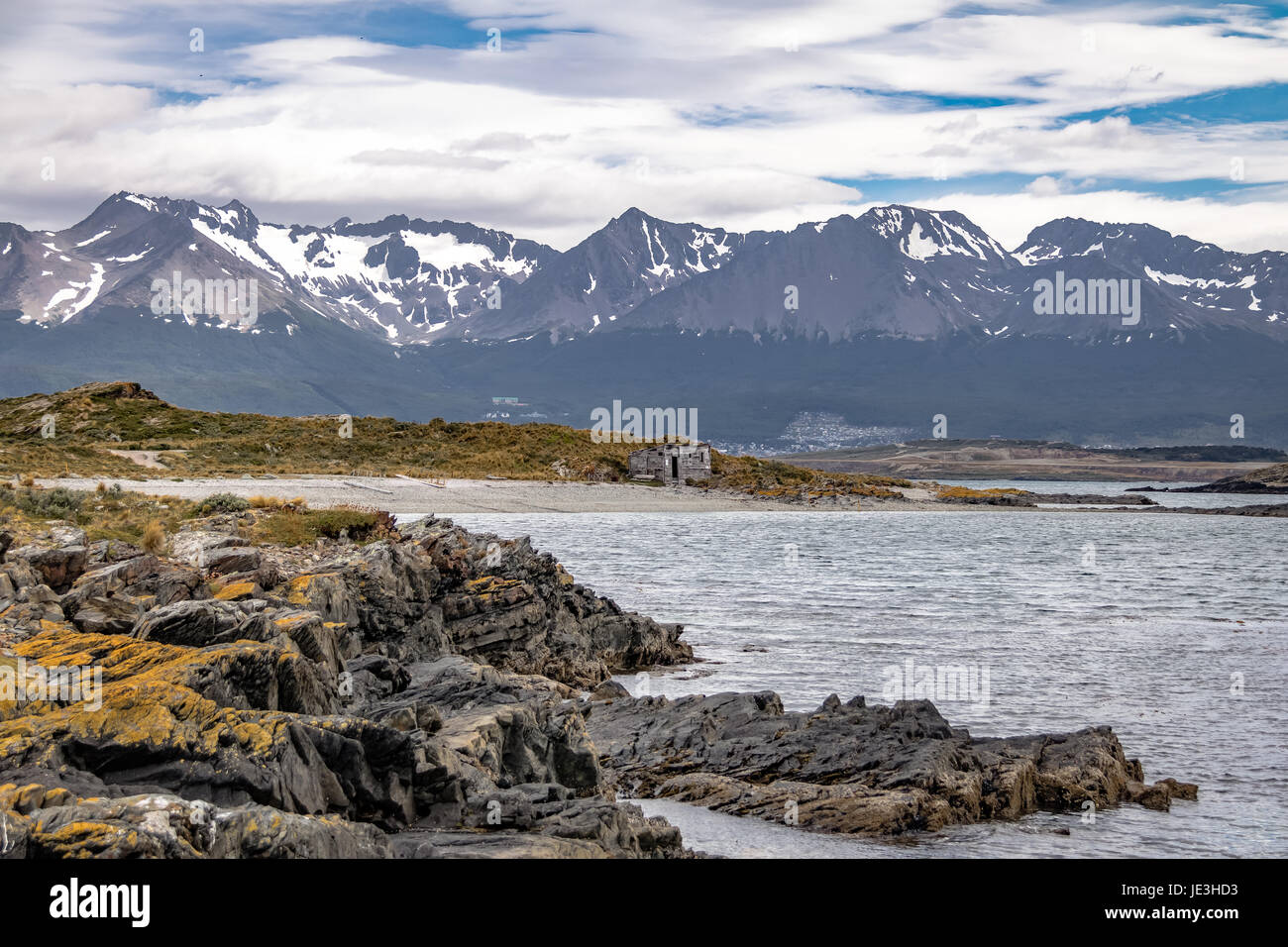 Timber house in Island and mountains view in Beagle Channel - Ushuaia, Tierra del Fuego, Argentina Stock Photo