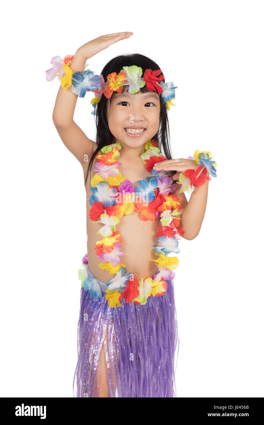 Asian Chinese little girl in hawaiian costume pretending to be a Hula