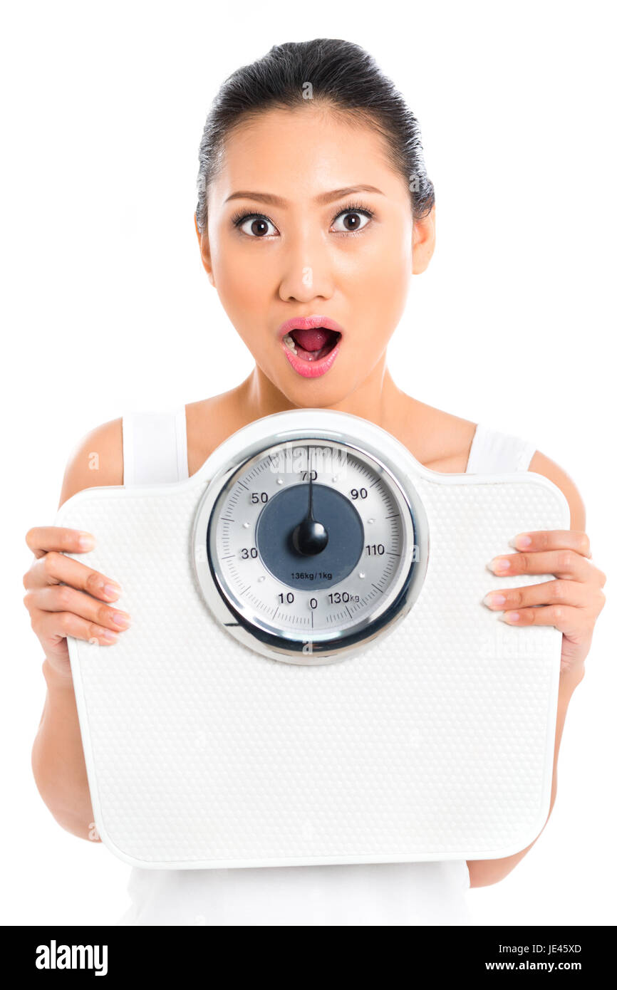 Asian woman with weight scale losing weight Stock Photo Alamy