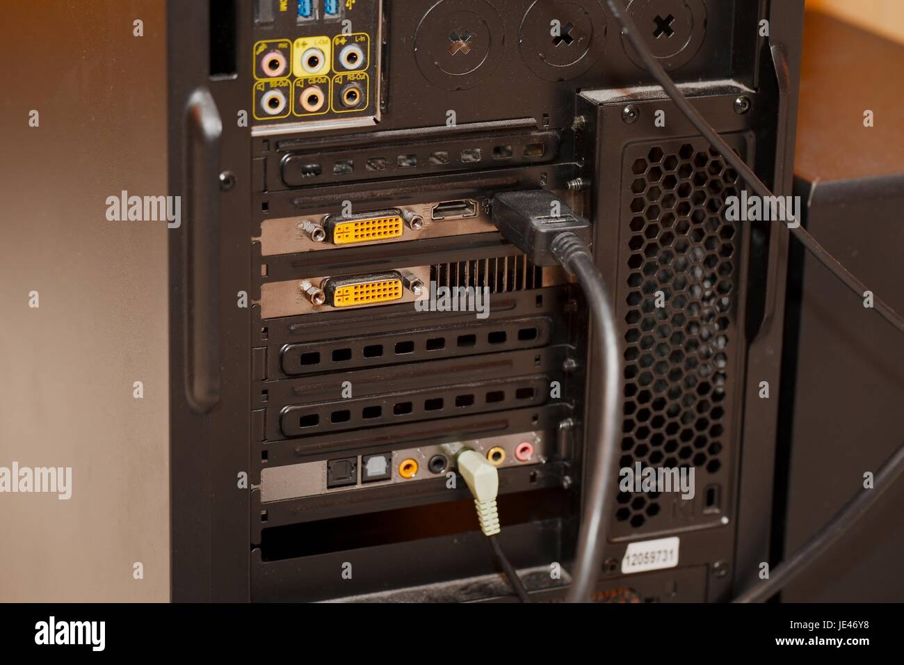 Backside of a computer with cables Stock Photo - Alamy