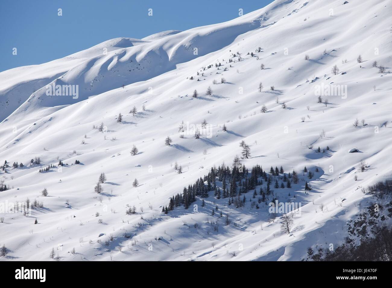 Snowy mountains in winter weather Stock Photo - Alamy