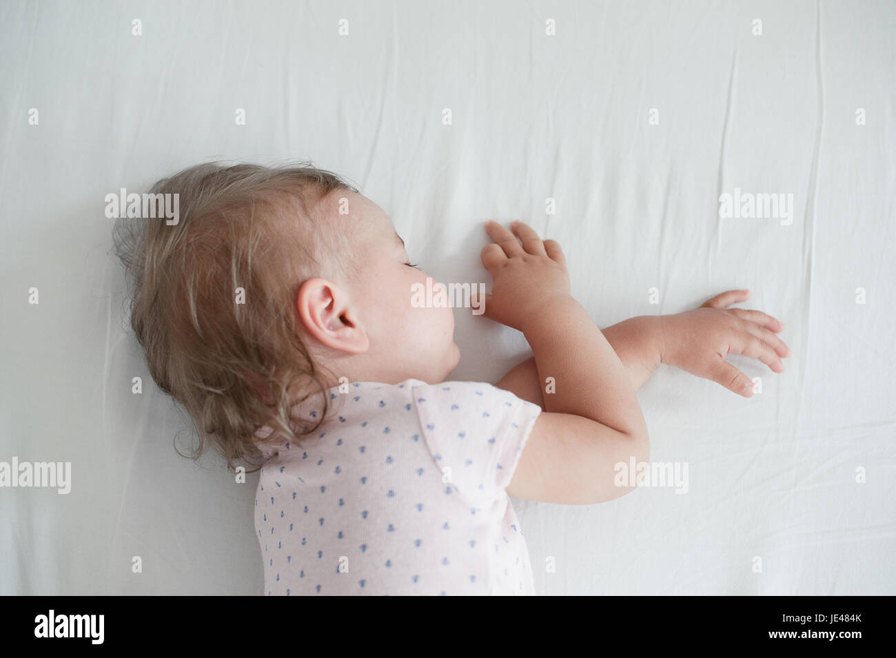 One year old baby girl sleeping Stock Photo Alamy