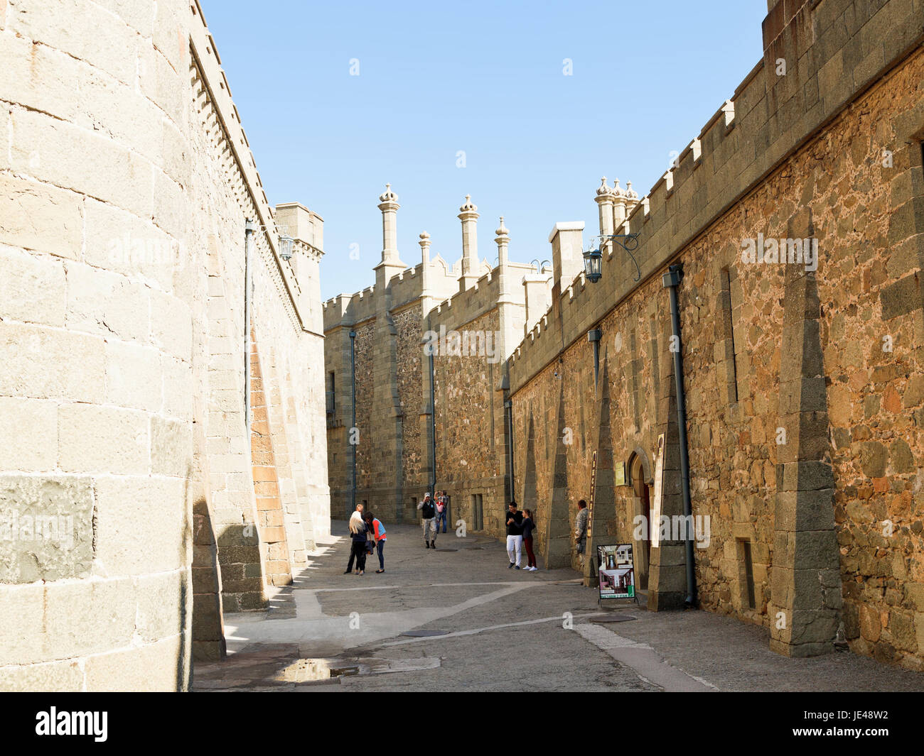 ALUPKA, RUSSIA - SEPTEMBER 28, 2014: tourists in Shuvalov Passage of Vorontsov (Alupka) Palace in Crimea. The palace was built in 1828-1848 for Prince Vorontsov for use as his summer residence Stock Photo