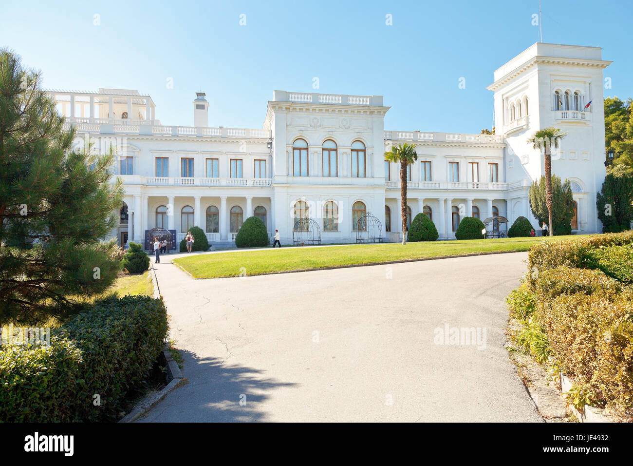 YALTA, RUSSIA - SEPTEMBER 30, 2014: facade of Grand Livadia Palace in Crimea. Livadia estate was summer residence of the Russian imperial family from 1860. Stock Photo
