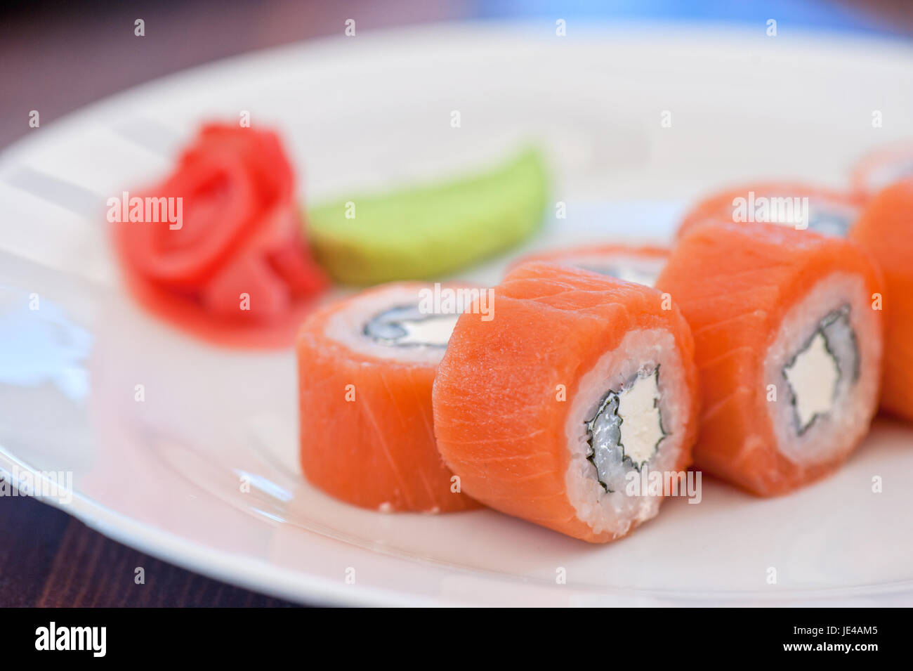 Salmon roll sushi tasty food Stock Photo - Alamy