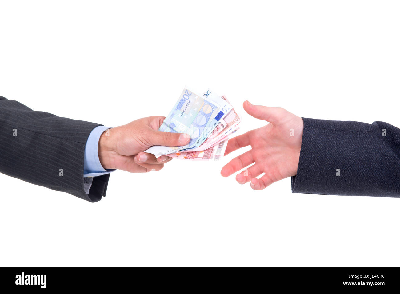 Detail of money changing hands Stock Photo