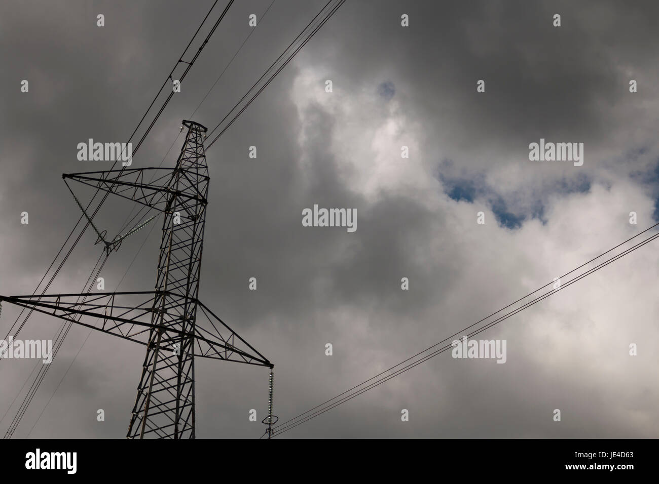 High-voltage tower sky background Stock Photo - Alamy