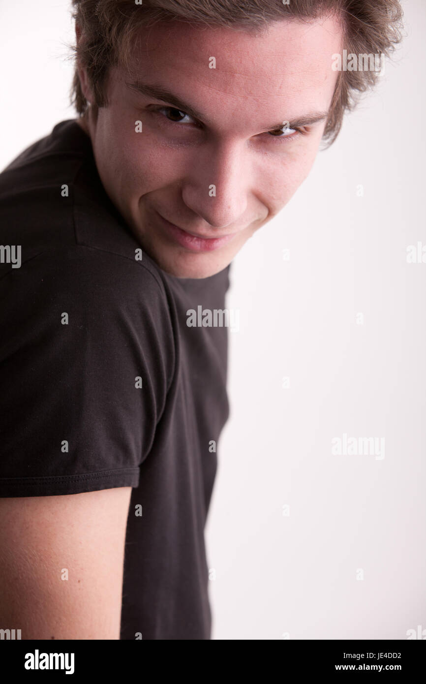 this self confident guy looks you straight in your eyes Stock Photo